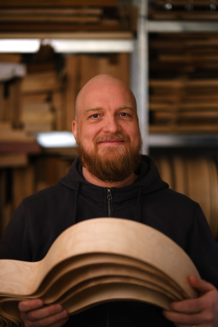 Jukka from Archtop Laminates in the workshop with laminated guitar components